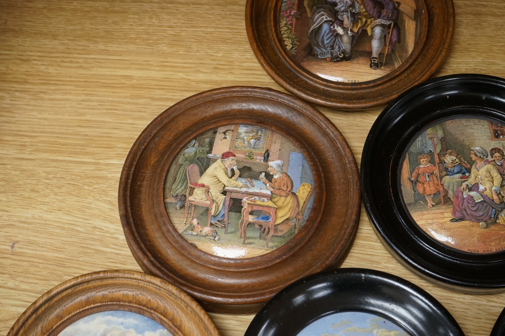 A collection of eleven framed pot lids, including one of the Chrystal Palace; The Grand International Building of 1851, For The Exhibition of Art and Industry of all Nations, Crystal Palace pot lid 12.5cm diameter not in